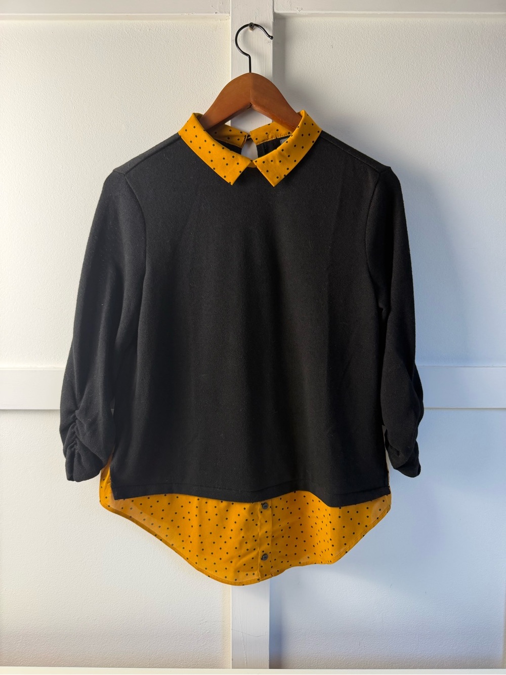 Black Pullover Top with Mustard Polka Dot Collar and Hem
